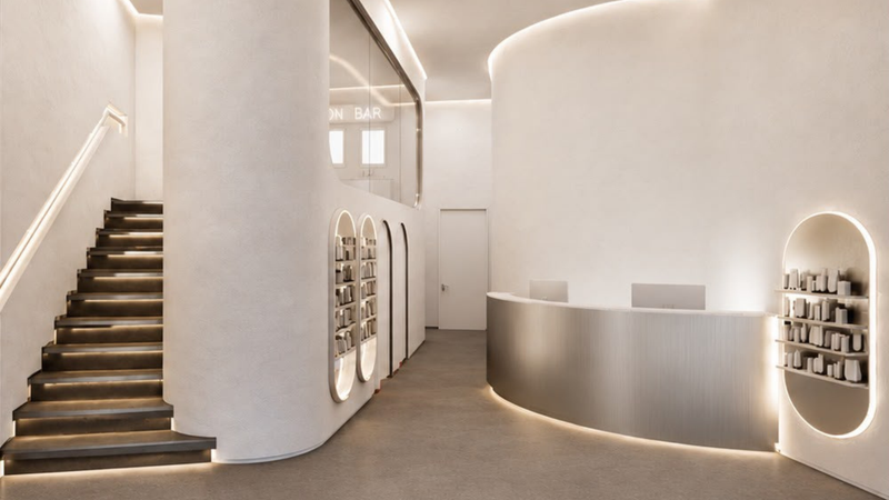 Architectural render of Elephant and Castle Clinic featuring the staircase, Injectual products, and reception desk.